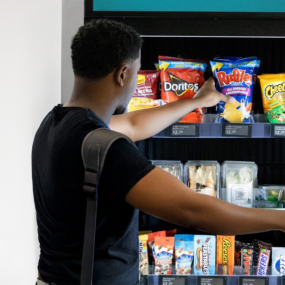 Customer grabbing snacks
